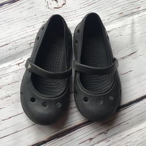 Black crock sandals
